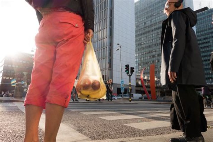 Road, Trousers, Window, Street, Infrastructure, Coat, Metropolitan area, Pedestrian crossing, Urban area, Bag, Road, Trousers, Window, Street, Infrastructure, Coat, Metropolitan area, Pedestrian crossing, Urban area, Bag,