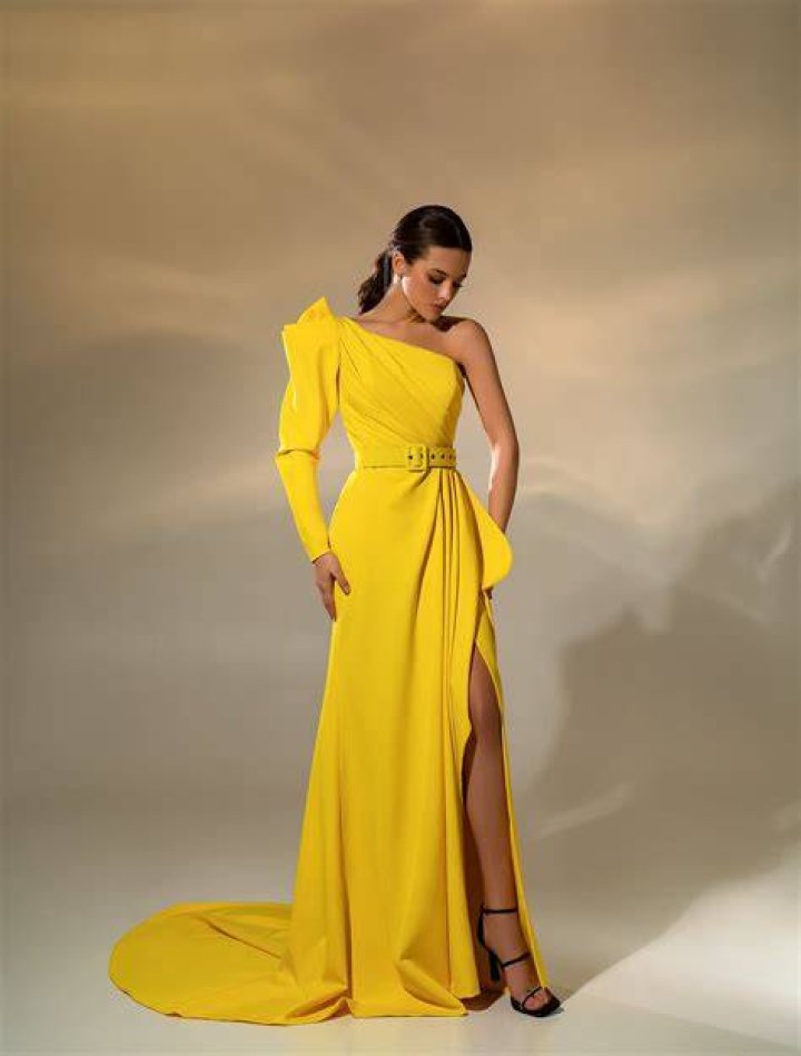 Yellow, Transport, Dress, Shoulder, Standing, One-piece garment, Amber, Railway, Rolling stock, Gown, Yellow, Transport, Dress, Shoulder, Standing, One-piece garment, Amber, Railway, Rolling stock, Gown,